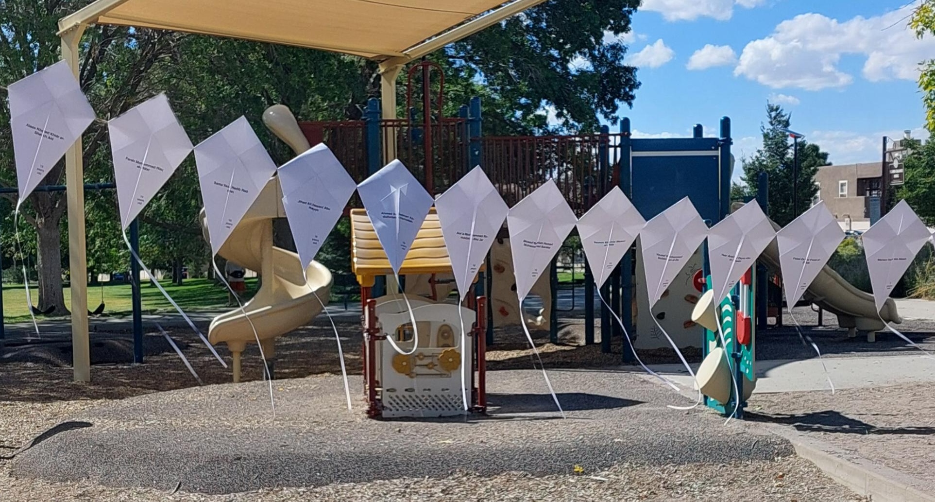 kites hanging in a playground